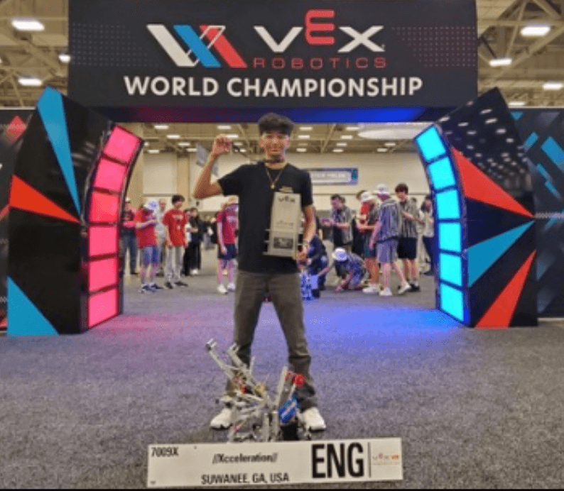 Syon Goel at the VEX Robotics World Championship with his robot
